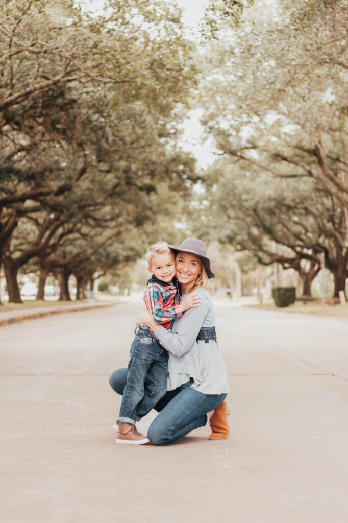 Mother and son hug each other for Motherhood session, by Ally's Photography in Houston.