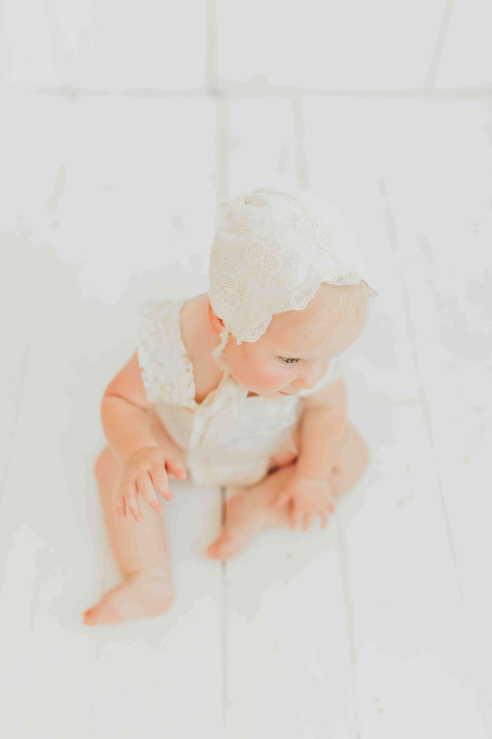 baby wearing a bonnet from sweet bambini houston