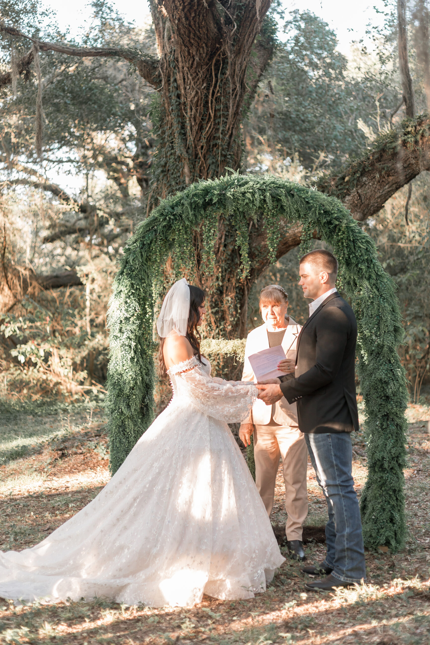 bride and groom get married by grooms grandmother, making for an intimate and personal wedding ceremony.